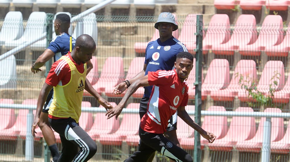 Mandla Ncikazi with PSL side Orlando Pirates players during a training session