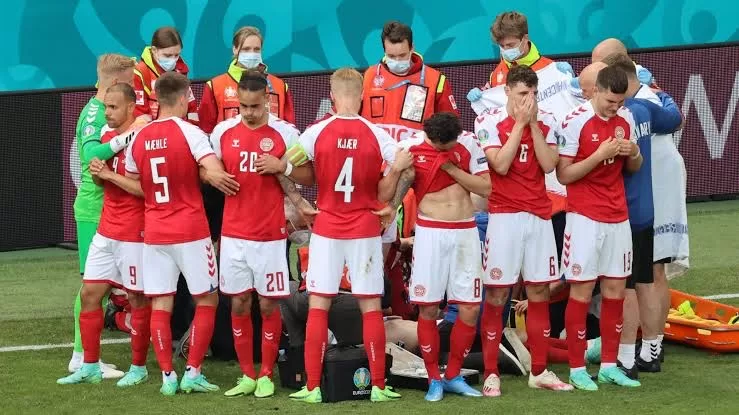 Christian Eriksen's teammates provided cover for him