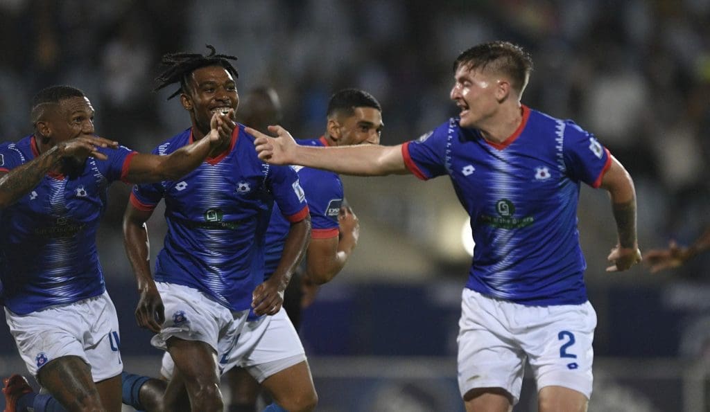 Bradley Cross and Maritzburg United players celebrating a goal