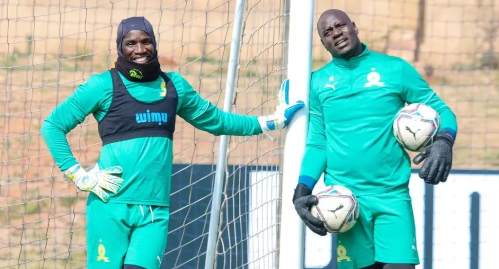 Kennedy Mweene with Denis Onyango at training