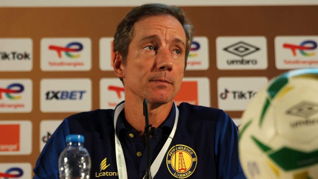 Petro de Luanda coach Alexander Santos addressing the media.