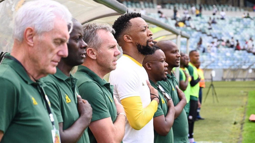 Bafana Bafana technical team singing national anthem ahead of Rwanda clash.