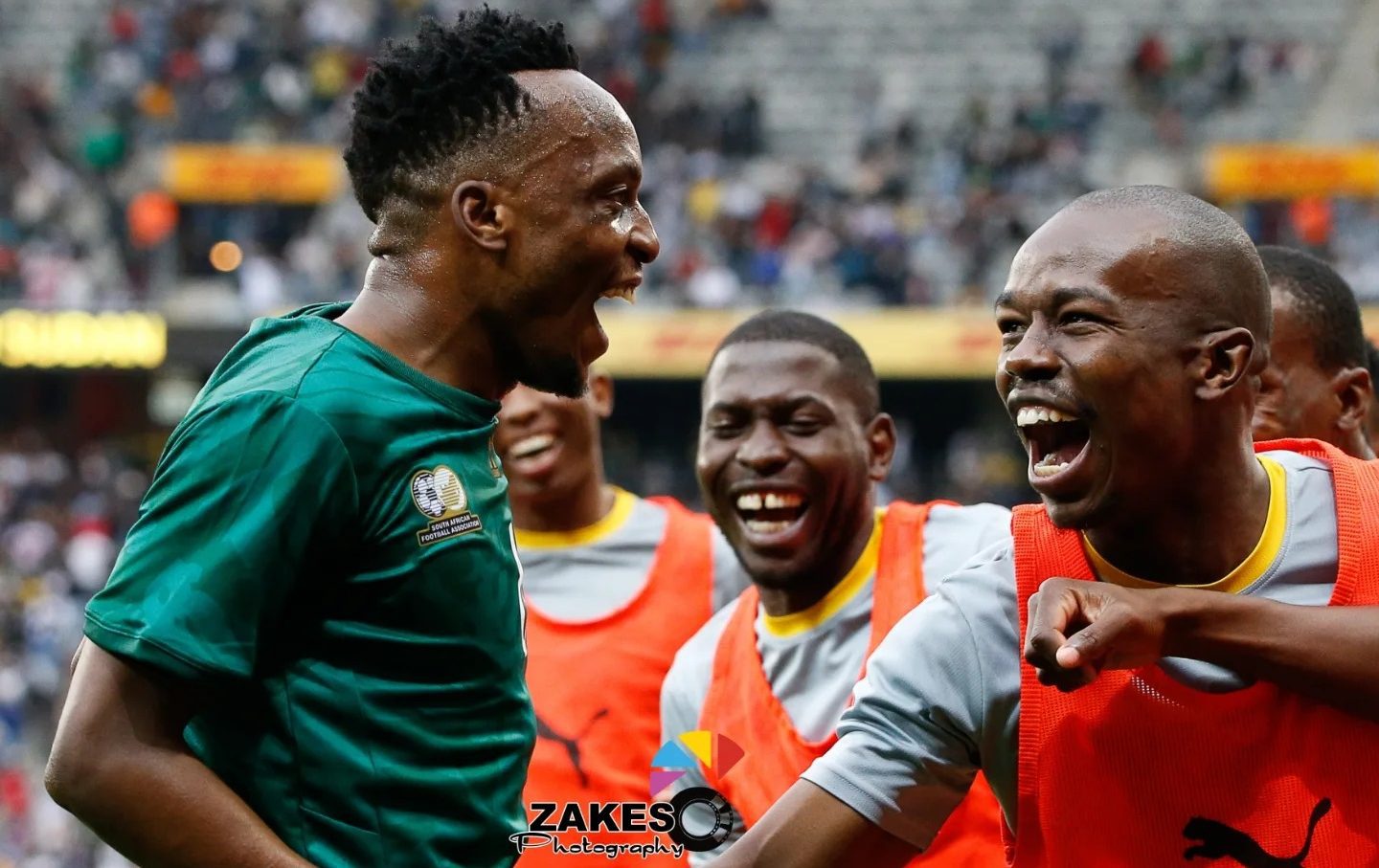 Patrick Maswanganyi celebrating a goal with his Bafana Bafana teammates