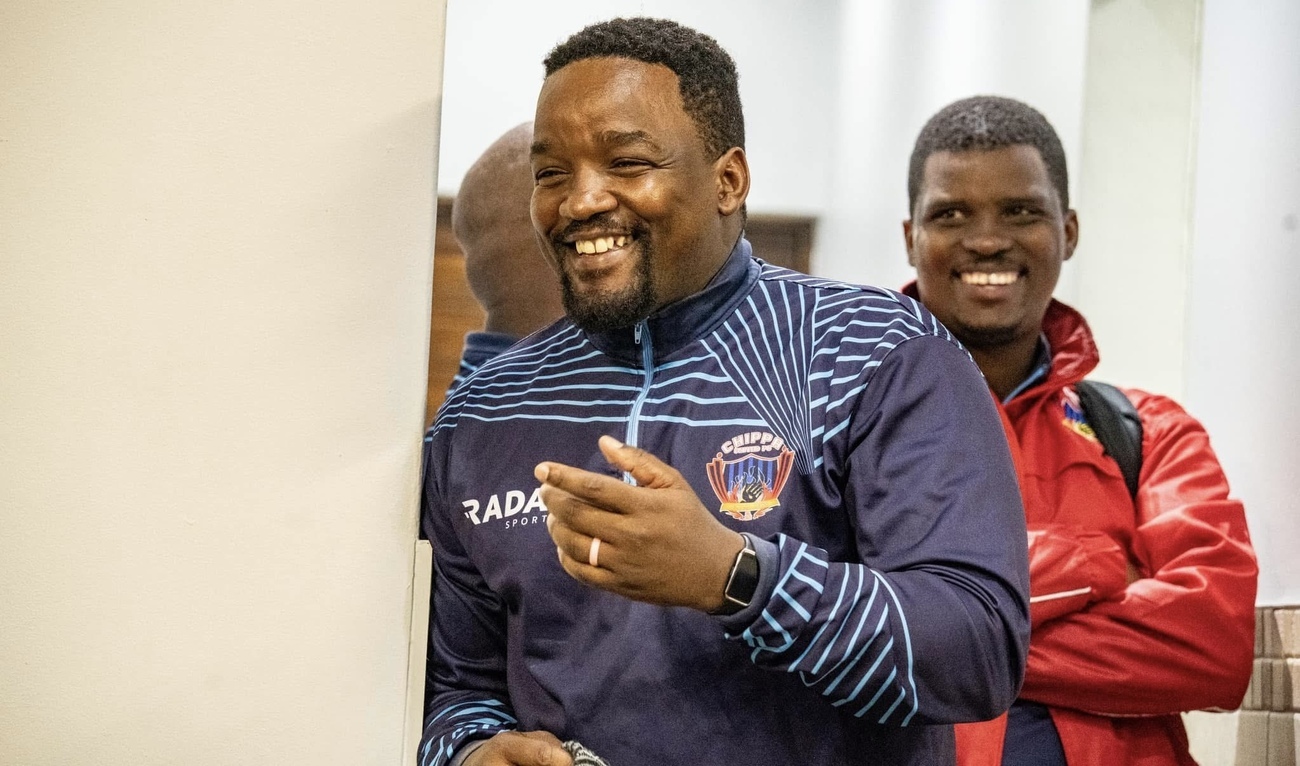 Chippa United coach Thabo September laughing