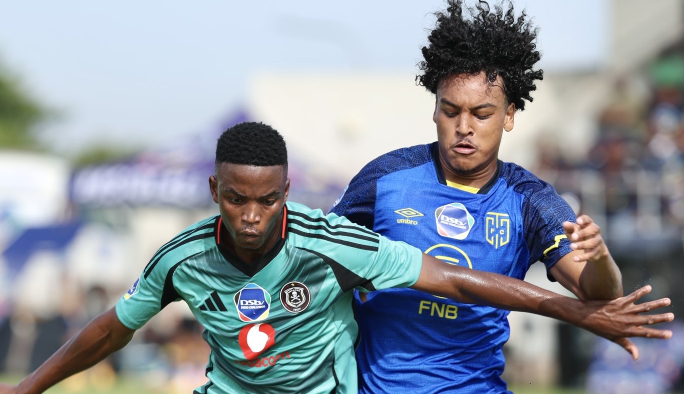 Orlando Pirates and Cape Town City DDC players challenging each other in the reserve league match