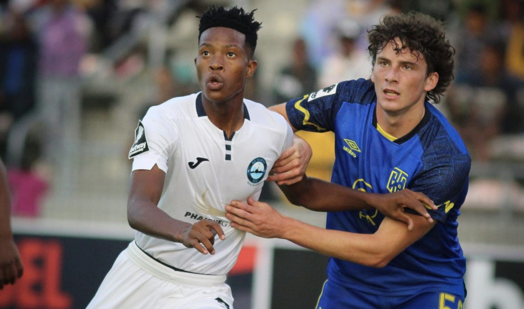Richards Bay FC star Yanela Mbuthuma battling for a ball against Cape Town City youngster Gabriel Amato