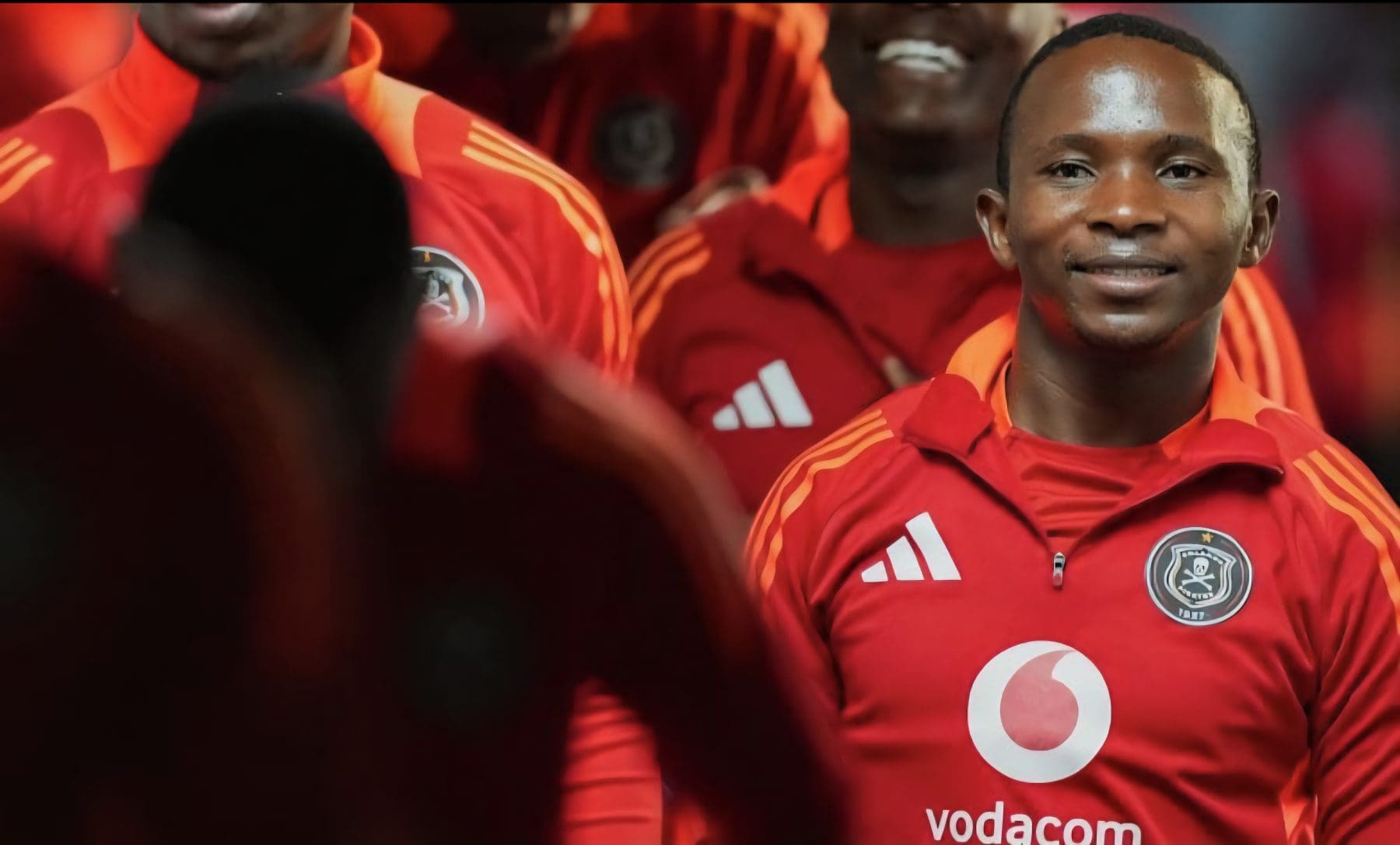 Ndabayithethwa Ndlondlo with his teammates at Orlando Pirates