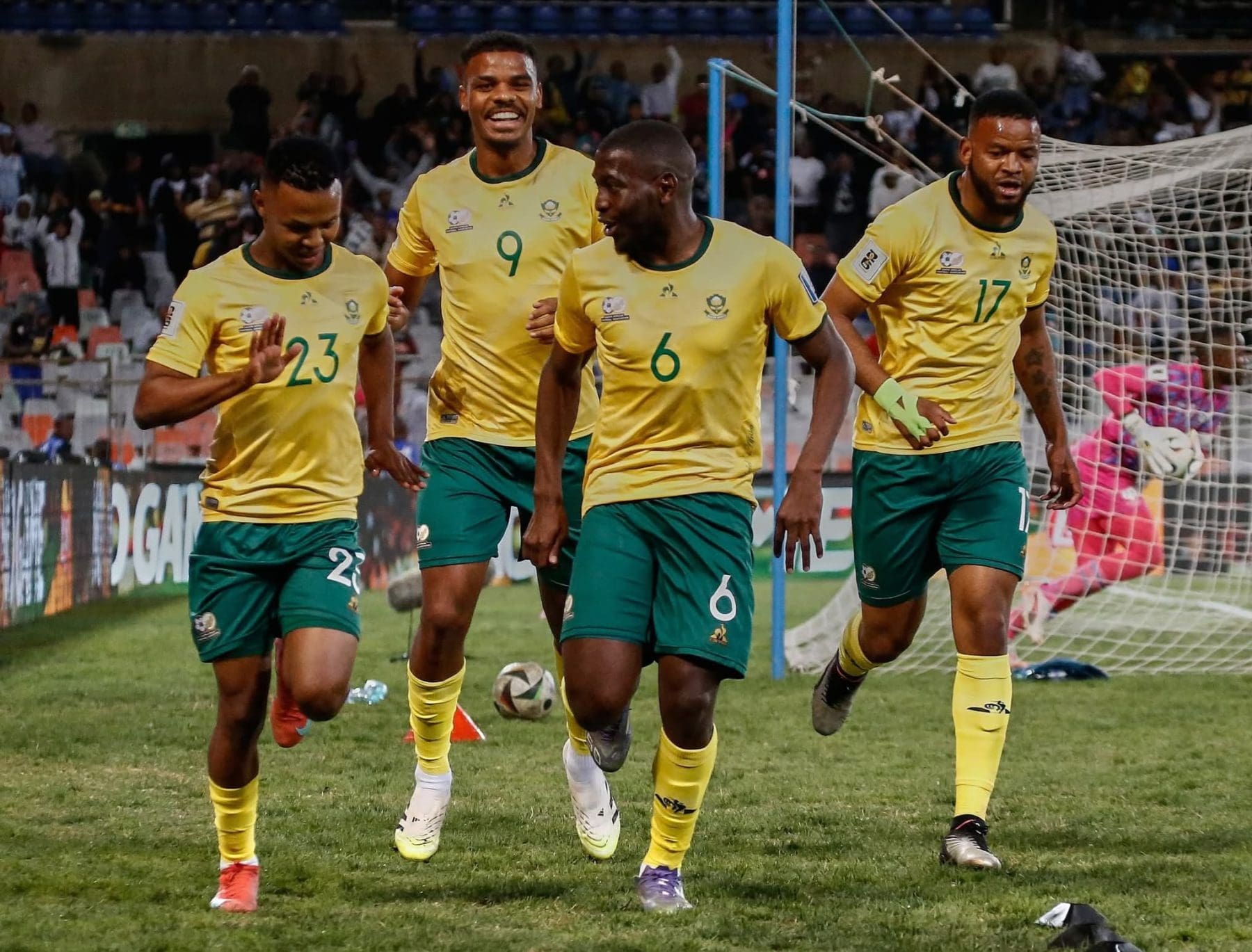 Bafana Bafana players celebrate a goal against Lesotho at the Toyota Stadium in Mangaung.