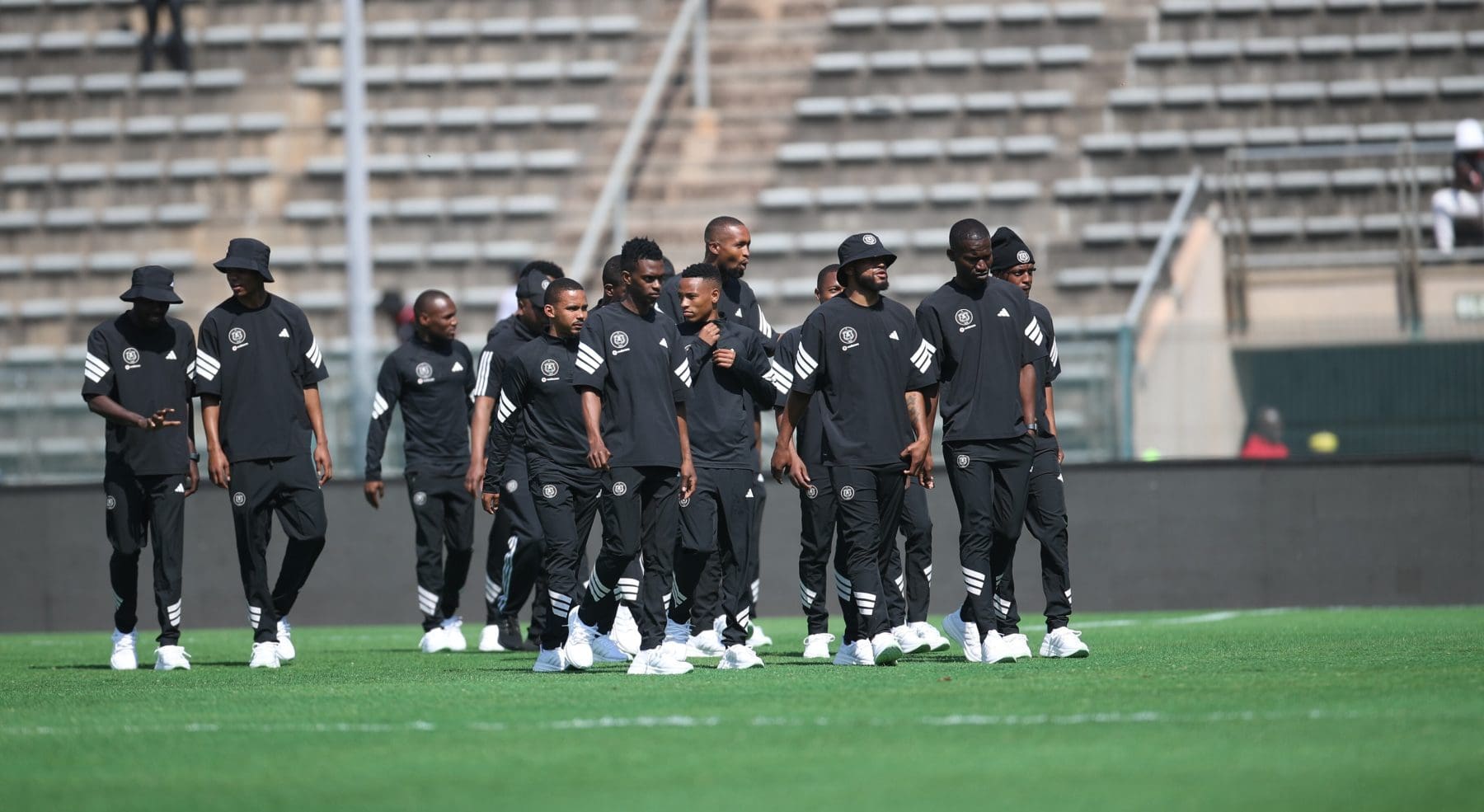 Orlando Pirates players during a pitch inspection
