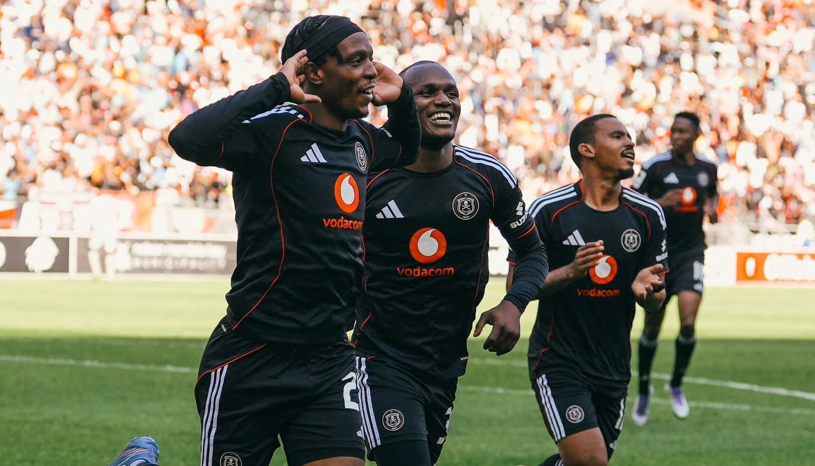 Patrick Maswanganyi celebrating with teammates after scoring for Orlando Pirates
