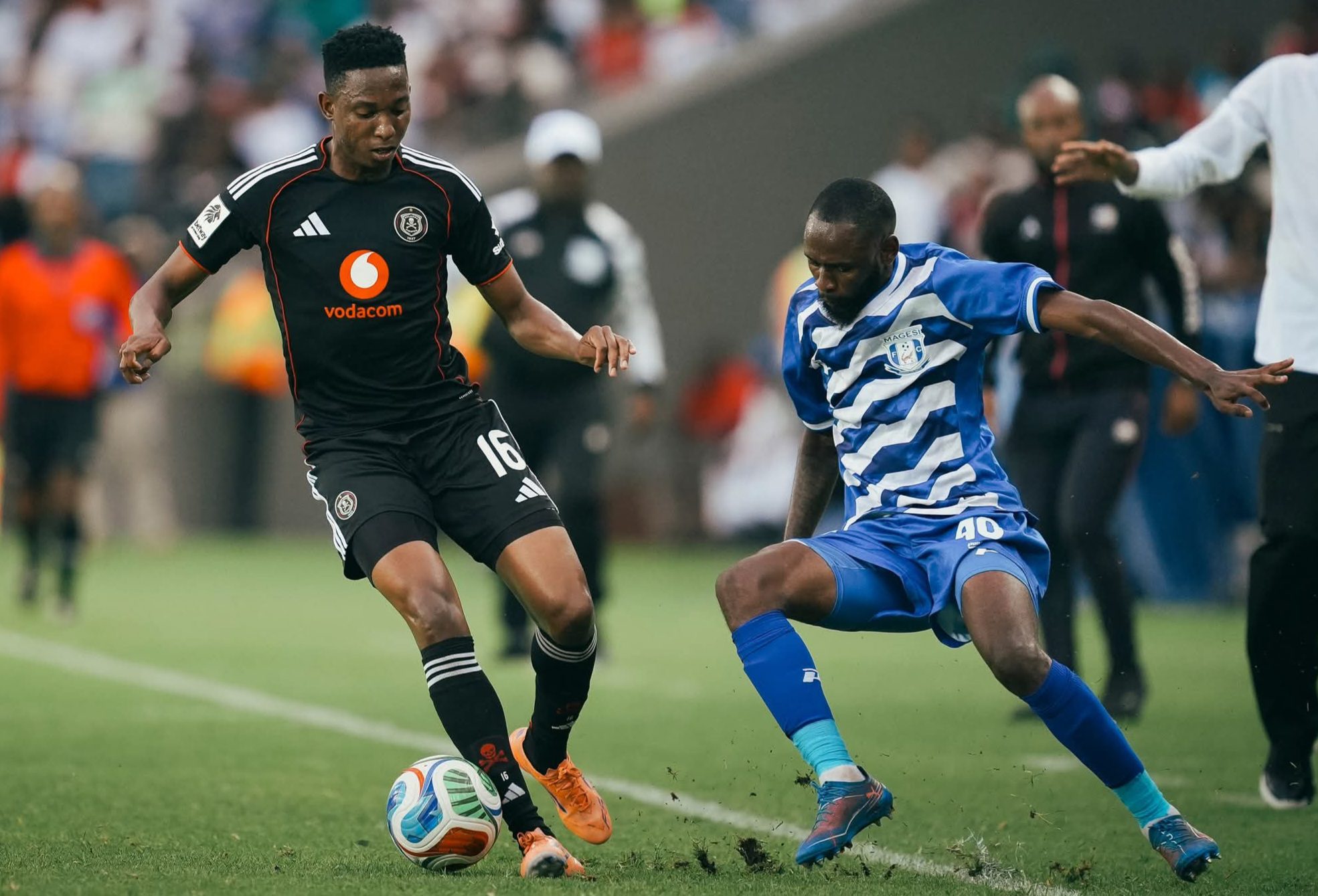 Thalente Mbatha and Kgomotso Mosadi in action during a Betway Premiership match.