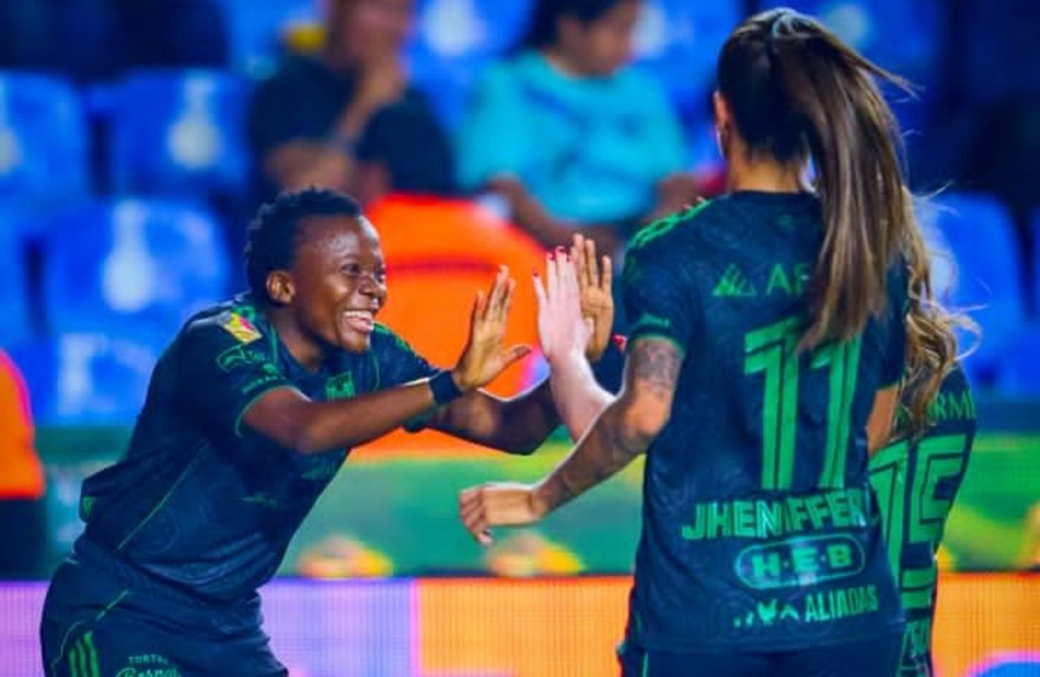 Thembi Kgatlana celebrating her goal for Club Tigres UANL