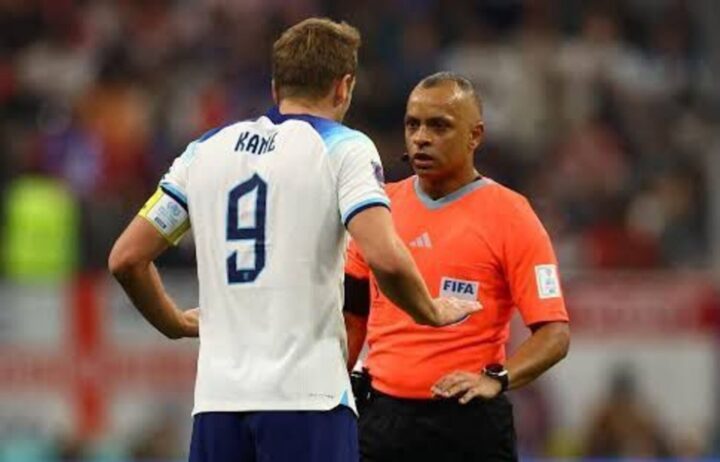England captain Harry Kane and Brazilian referee Wilton Pereira Sampaio
