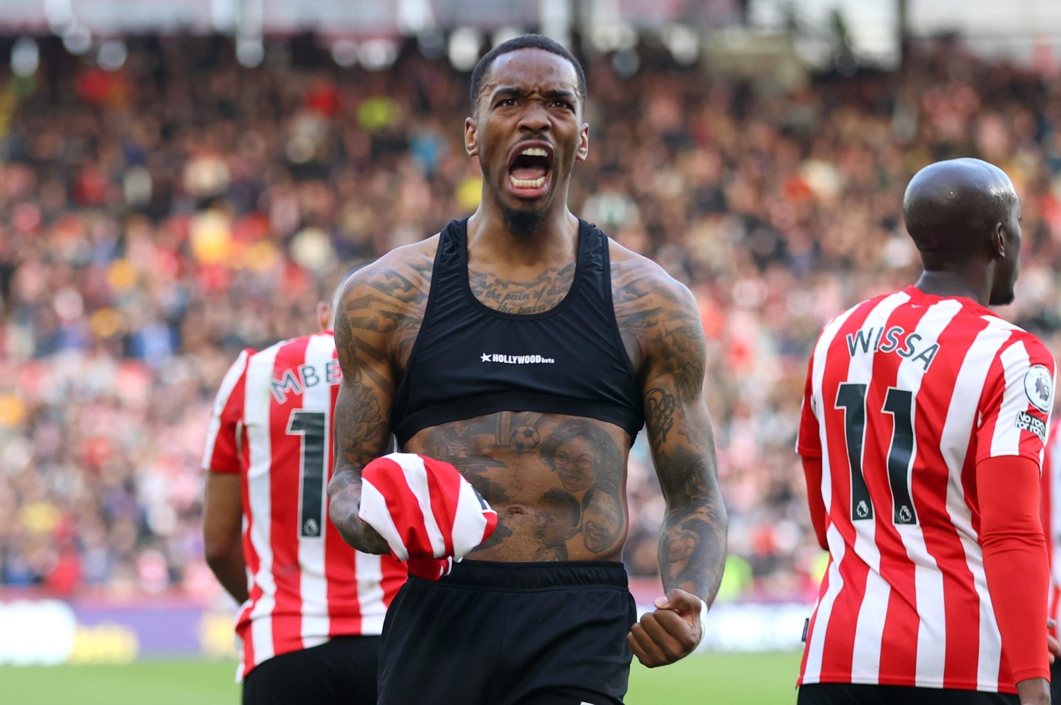  Ivan Toney celebrates a goal for Brentford F.C. during a match at the Brentford Community Stadium.