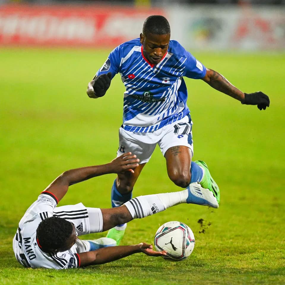 Siboniso Conco with Paseka Mako of Orlando Pirates. 