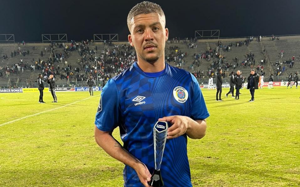 SuperSport United midfielder Grant Margeman showing off his Man of the Match award