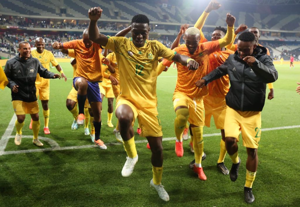 Hlongwani celebrating his brace with his Bafana teammates