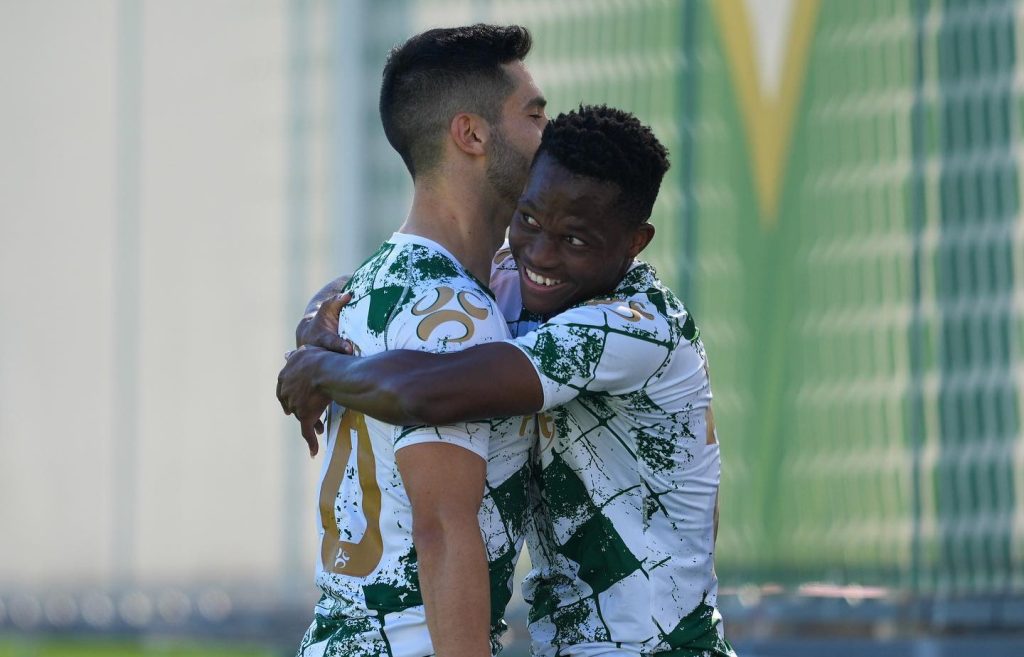 Kobamelo Kodisang celebrating a goal with a teammate at Moreirense