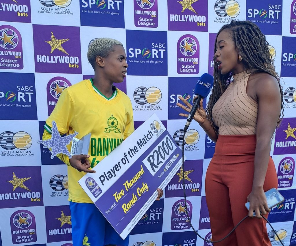 Lelona Daweti receives the Player of the Match award 