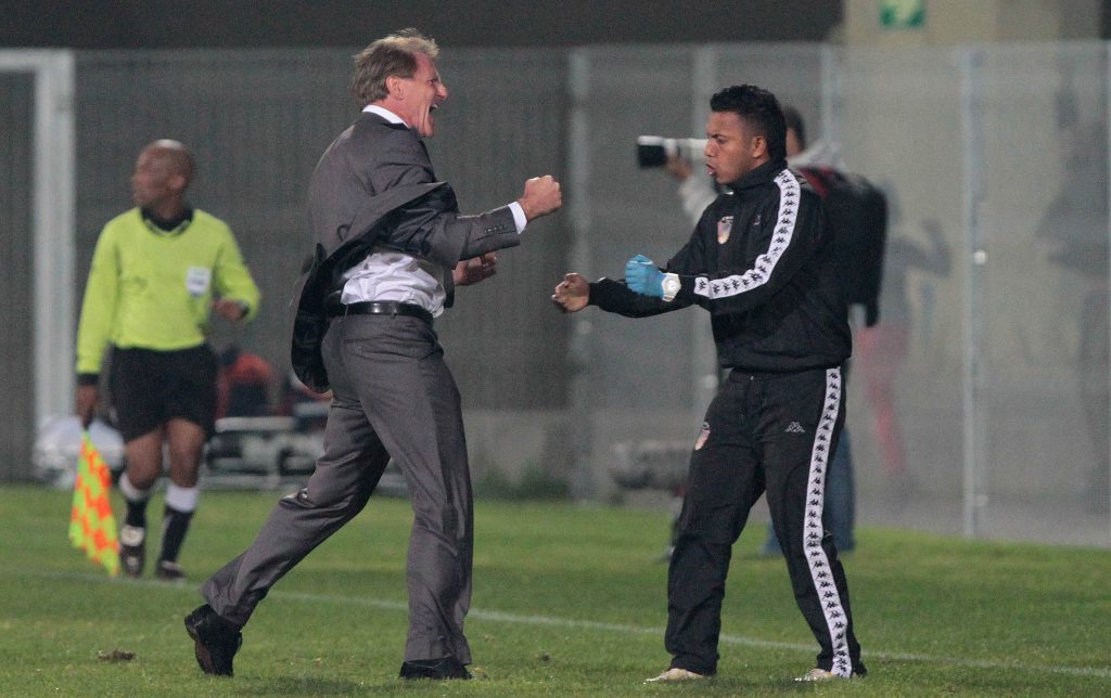 Mark Harrison celebrating a goal with a technical team member during his Chippa stint