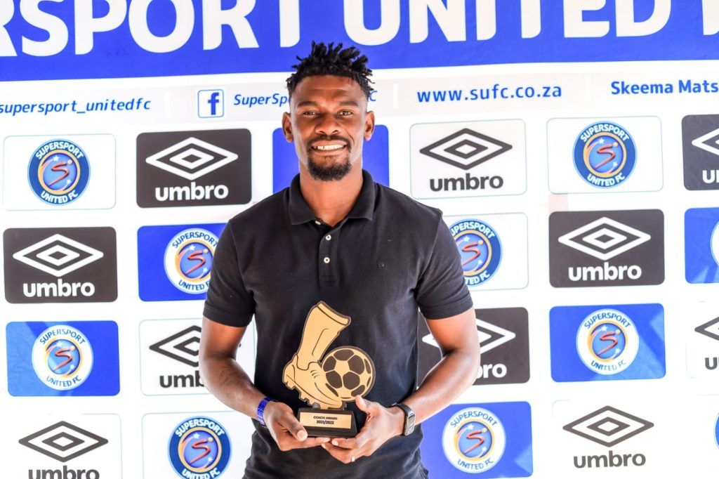 Boalefa Pule holding the Coaches Award for the 2021/22 season at the SuperSport United end-of-the-year award ceremony.