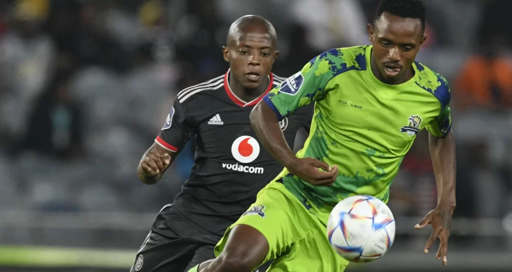 Sicelo Hlatshwayo challenged by Orlando Pirates striker Zakhele Lepasa