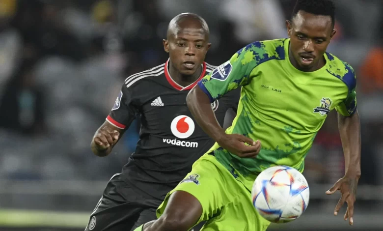 Sicelo Hlatshwayo challenged by Orlando Pirates striker Zakhele Lepasa