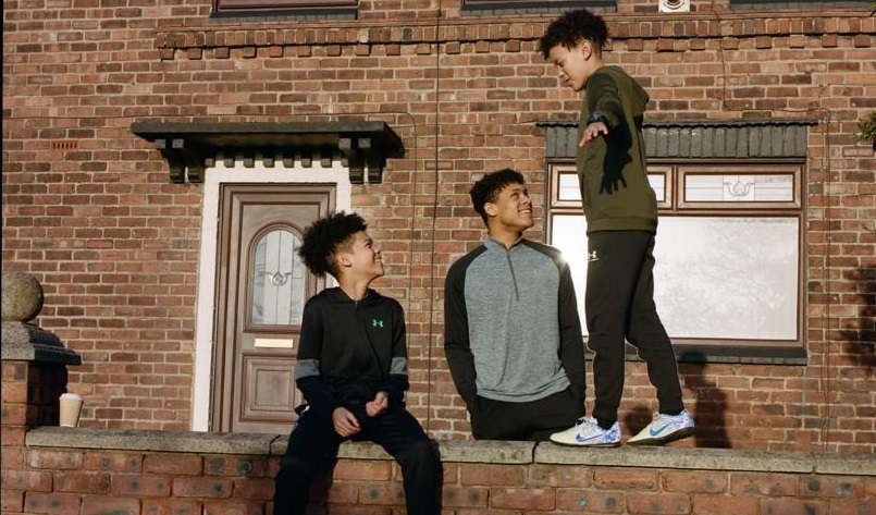 The Shelton boys in front of Trent Alexander-Arnold's childhood home in Liverpool