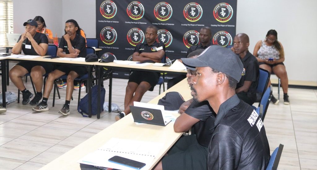Coaches paying attention at Pitso Mosimane Soccer Schools induction 