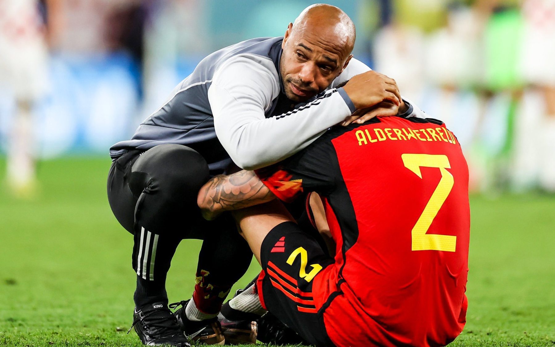 Thierry Henry consoling Alderweireld