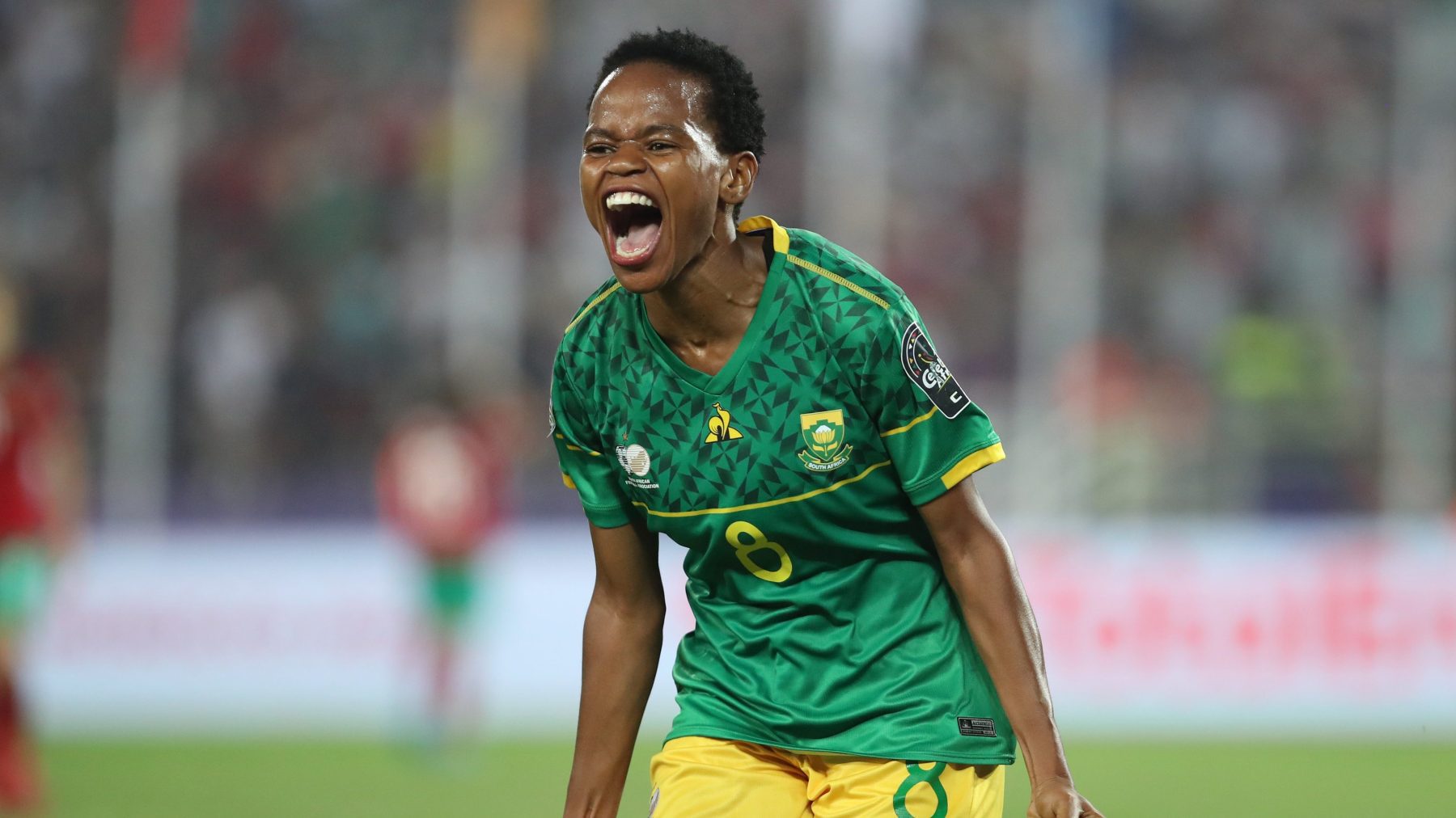 Hildah Magaia celebrating her brace against Morocco in the WAFCON final. 