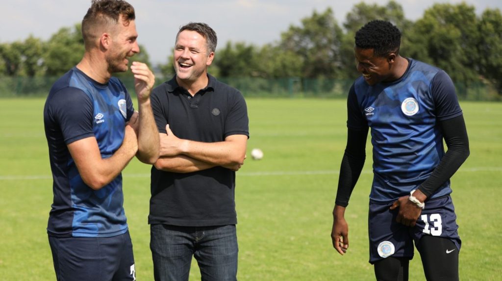 Michael Owen shares a joke with Gabuza and Grobler