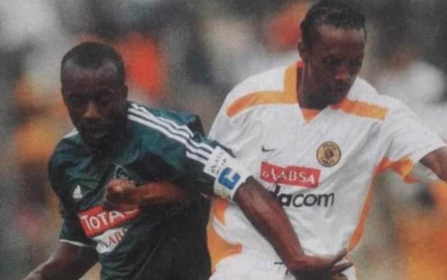 Maimane Phiri of Ajax Cape Town and the late John Moshoeu of Kaizer Chiefs during their playing days