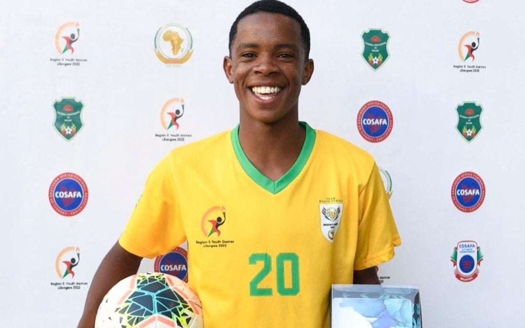 SA U17 star Siyabonga Mabena showing off his Man of the Match award.