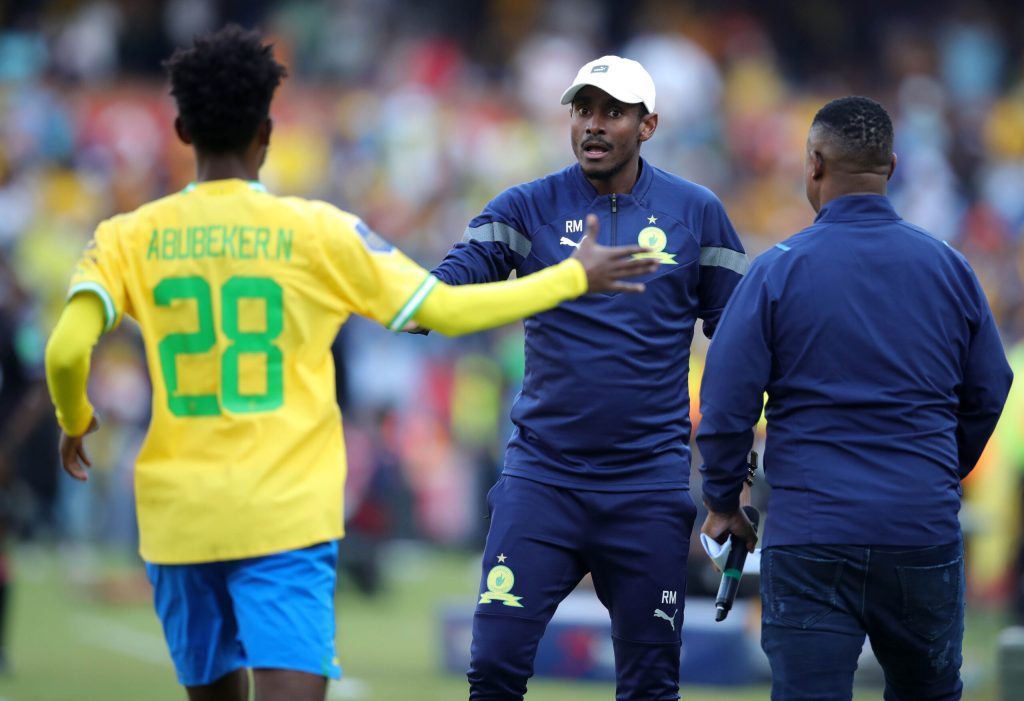 Abubeker Nasir celebrates a victory with Rhulani Mokwena during the DStv Premiership 2022/23 match