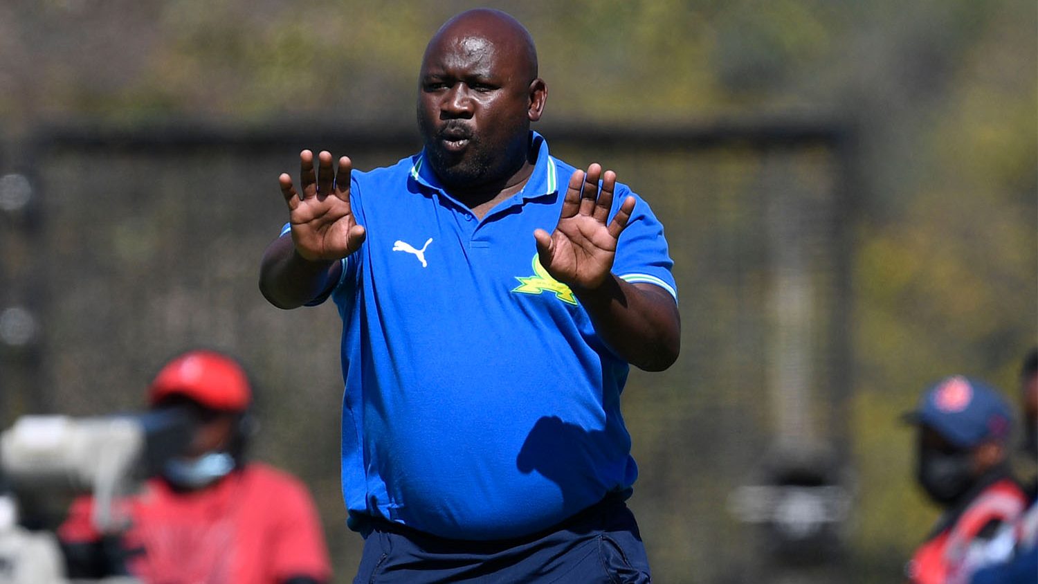 Mamelodi Sundowns Ladies head coach Jerry Tshabalala giving his players instructions