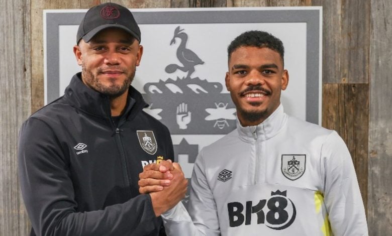 Lyle Foster and Burnley coach Vincent Kompany