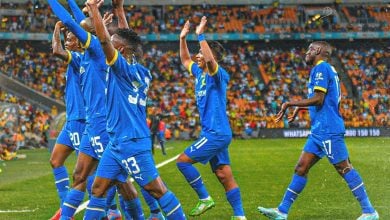 Mamelodi Sundowns players celebrating a goal against Kaizer Chiefs