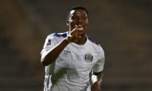 SuperSport United strker Thamsanqa COACHED BY STEVE BARKER Gabuza celebrating after scoring.