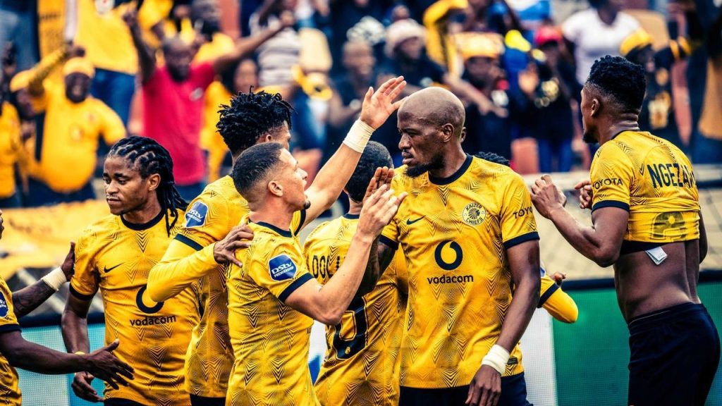 Kaizer Chiefs players celebrate after scoring.