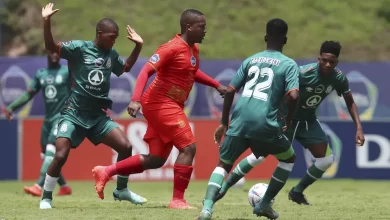 Andile Mpisane of Royal AM in action against AmaZulu
