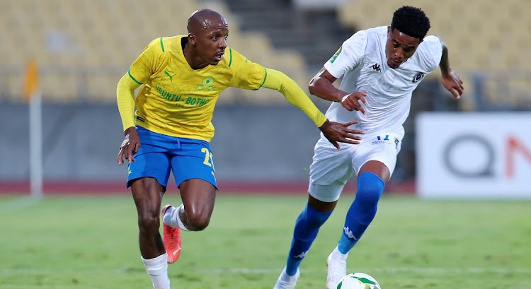 Khuliso Mudau of Mamelodi Sundowns is challenged by Gerald Phiri Jr of Al in the Caf Champions League. 