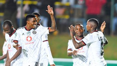 Monnapule Saleng celebrates with teammates after scoring a goal in the Nedbank Cup