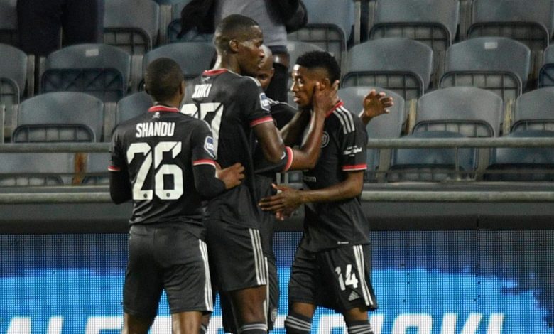 Orlando Pirates players celebrate with Mommapule Saleng after scoring a goal