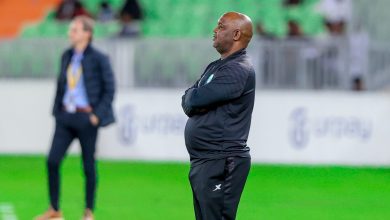 Pitso Mosimane watching his troops during a game