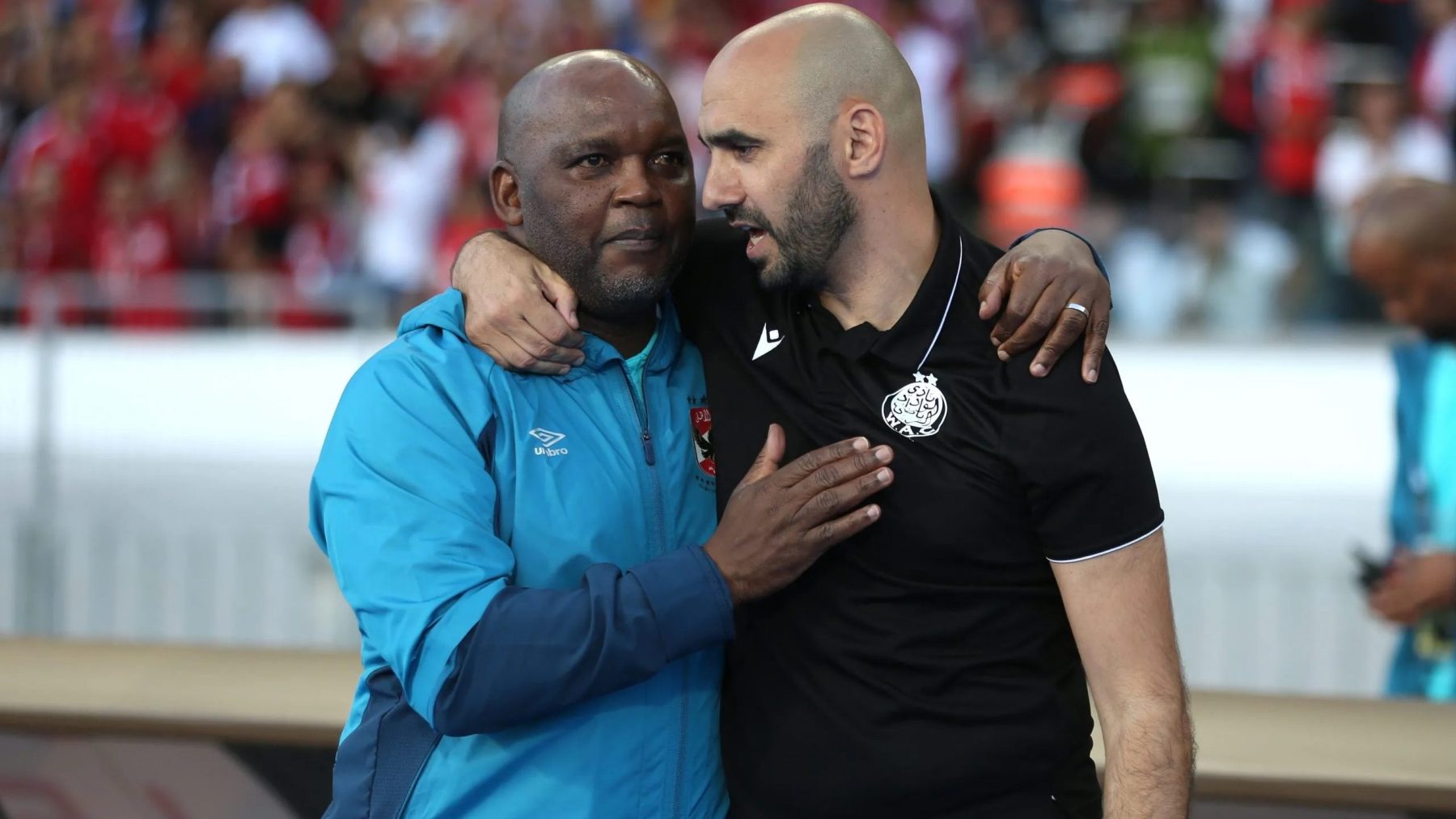 Pitso Mosimane with Morocco's national team coach Walid Regragui