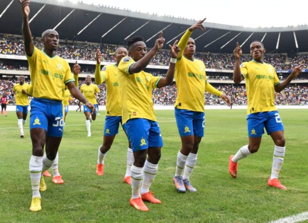 Cassius Mailula celebrates with teammates after scoring a goal. Photo courtesy of Mamelodi Sundowns