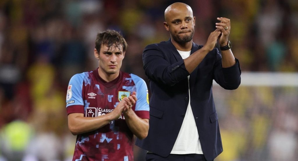 Vincent Kompany and his Burnley player applaud fans