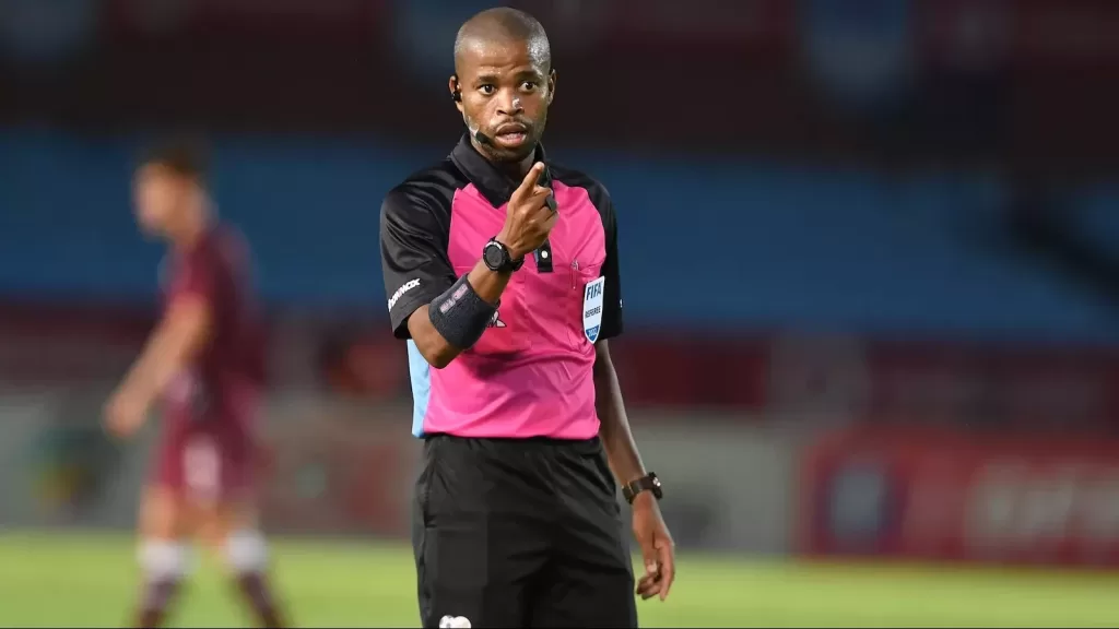 2023 FIFA 2023 referee panelist, Abongile Tom, officiating  a local game 