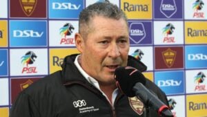 Coach Steve Barker speaking to the media.